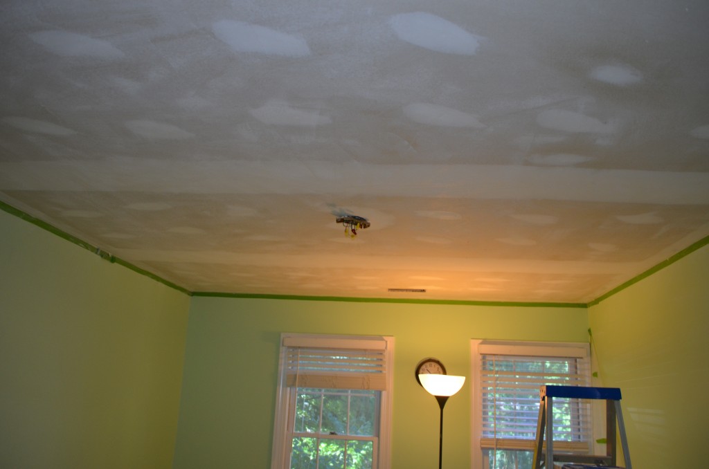 Guest bedroom after removing the popcorn ceiling.